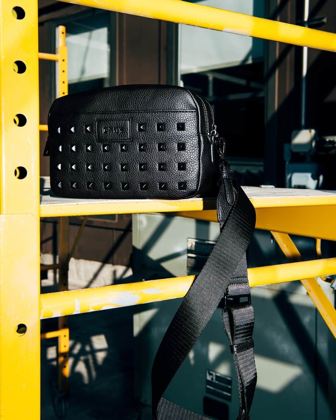のインスタグラム：「Tell me about it, stud. Tap to shop the Styla Studded Crossbody. #DKNYSTATEOFMIND」