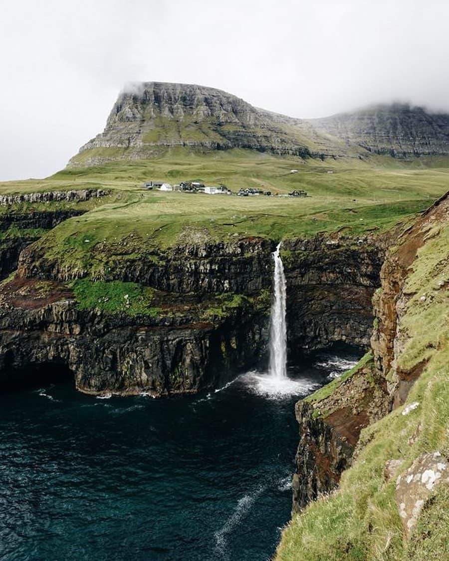 MR PORTERのインスタグラム：「For this week's trip, we're reminiscing about @theseptemberchronicles' travels to the enchanting Faroe Islands. The North Atlantic archipelago is located 320 kilometres north of Scotland and looks, quite frankly, like a fairytale - where waterfalls flow freely and houses emerge from the hillside. The destination has just cemented itself firmly on our bucket list. #MRPORTERintheWilderness」