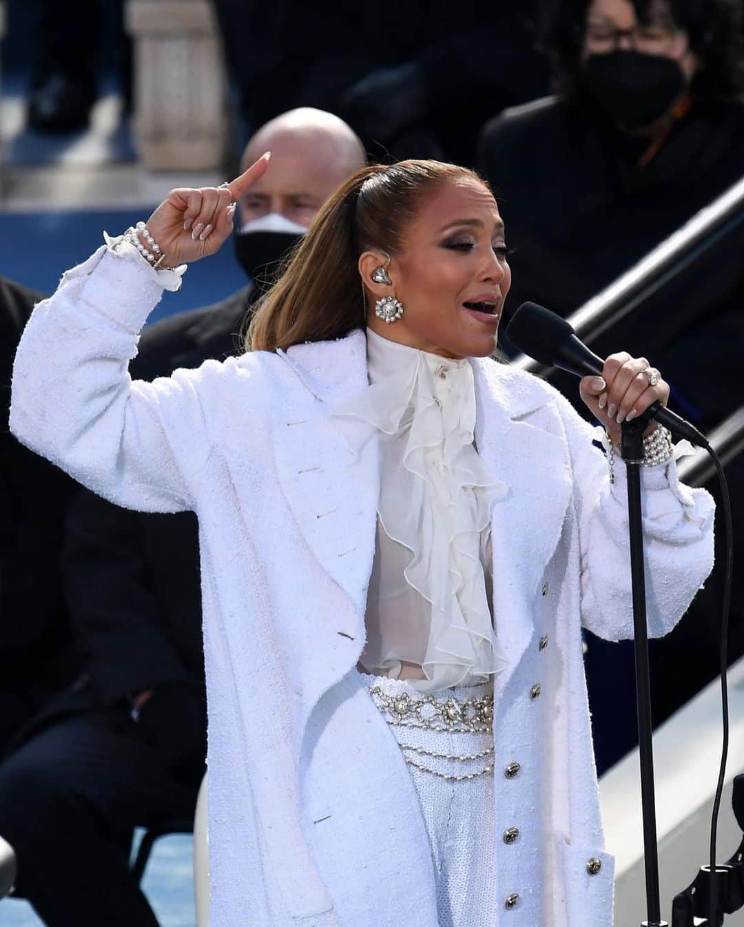 Fashion Weekのインスタグラム：「For her performance of "This Land Is Your Land: and "America the Beautiful" at now-President @joebiden's inauguration ceremony, @jlo wore white @chanelofficial from head-to-toe. 📸 by @gettyimages」