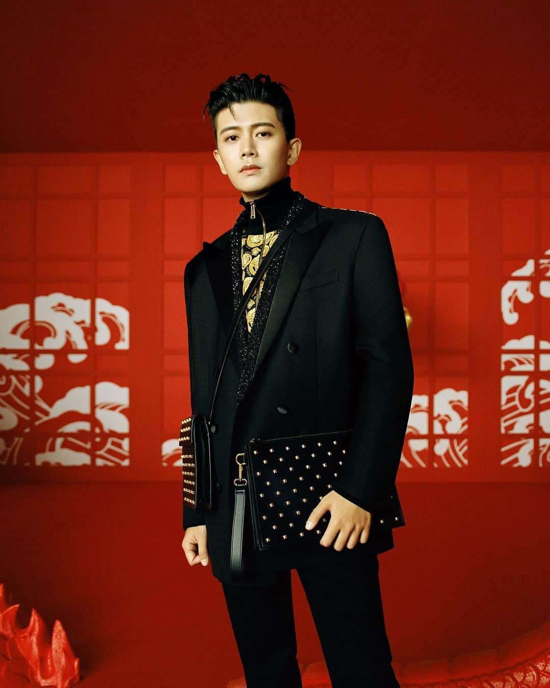 ジャンニヴェルサーチのインスタグラム：「Wishing you joy and prosperity - in celebration of the Lunar New Year, Allen Ren is photographed wearing our limited edition capsule collection. Learn more through the link in bio.」