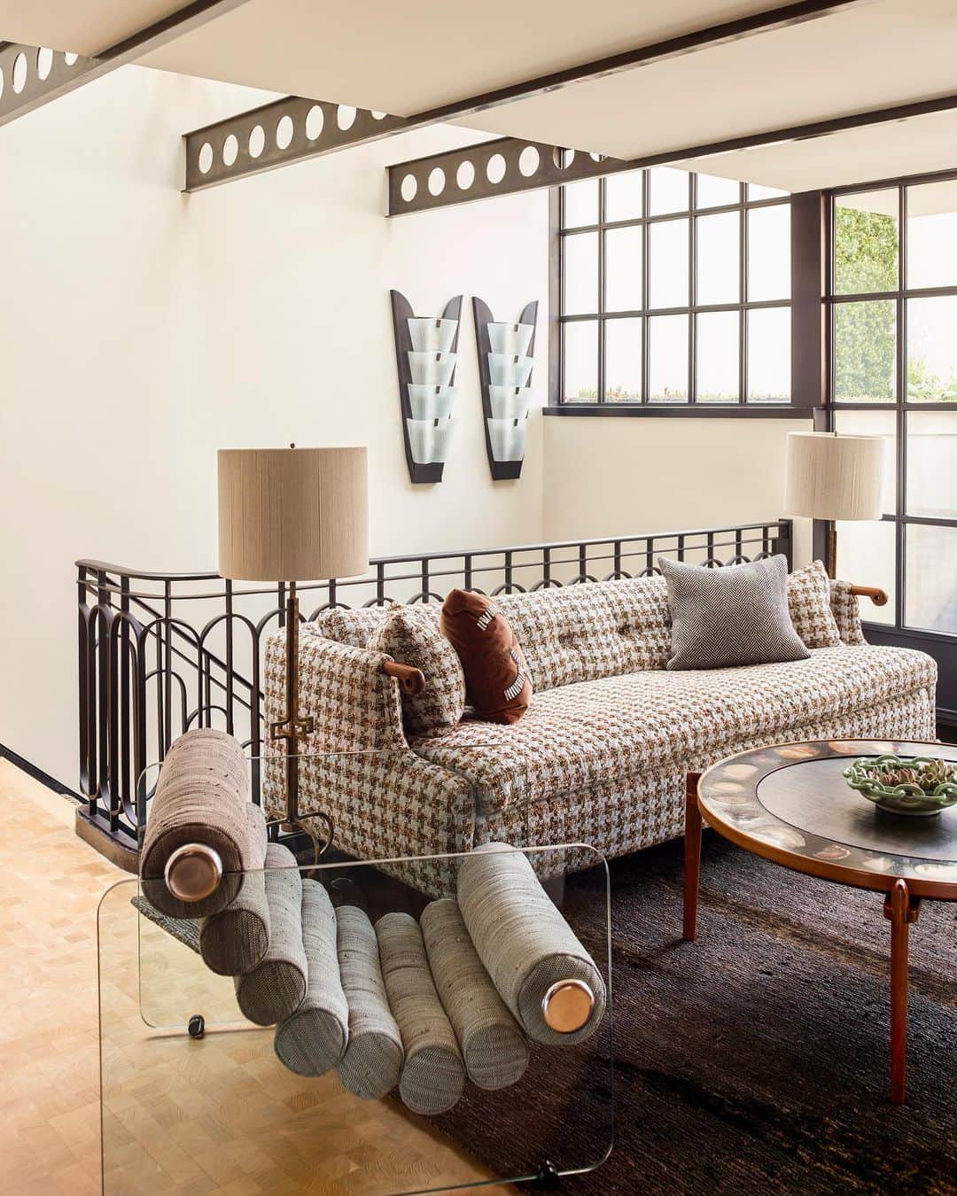 ケリーウェアスラーのインスタグラム：「LANDING SPACE. In this NYC townhouse, we designed a rooftop conservatory by industrial elements like metal ceiling beams and raw casement windows. In composition, a BDDW Abel sofa is accompanied by the Fabio Lenci glass chair from the 1960s and two vintage Belgian floor lamps from the 1970s. XK」