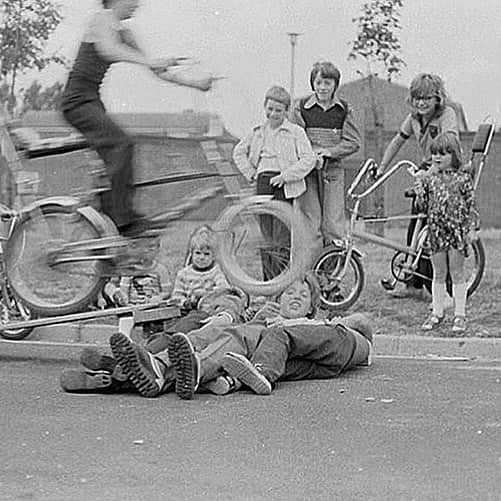 バラクータさんのインスタグラム写真 - (バラクータInstagram)「Happy Friday! Are you ready for another #BaracutaHeritage? Can you guess where this group of daredevils carried out their stunts? Let us know in the comments.  .  It was in Halewood near Liverpool in the 1970s. Did you get it? © Dave Nicholls, All rights reserved. Repost via @britishculturearchive  #documentaryphotography #reallife #blastfromthepast #everydaylife #britishculture」1月22日 17時02分 - baracuta