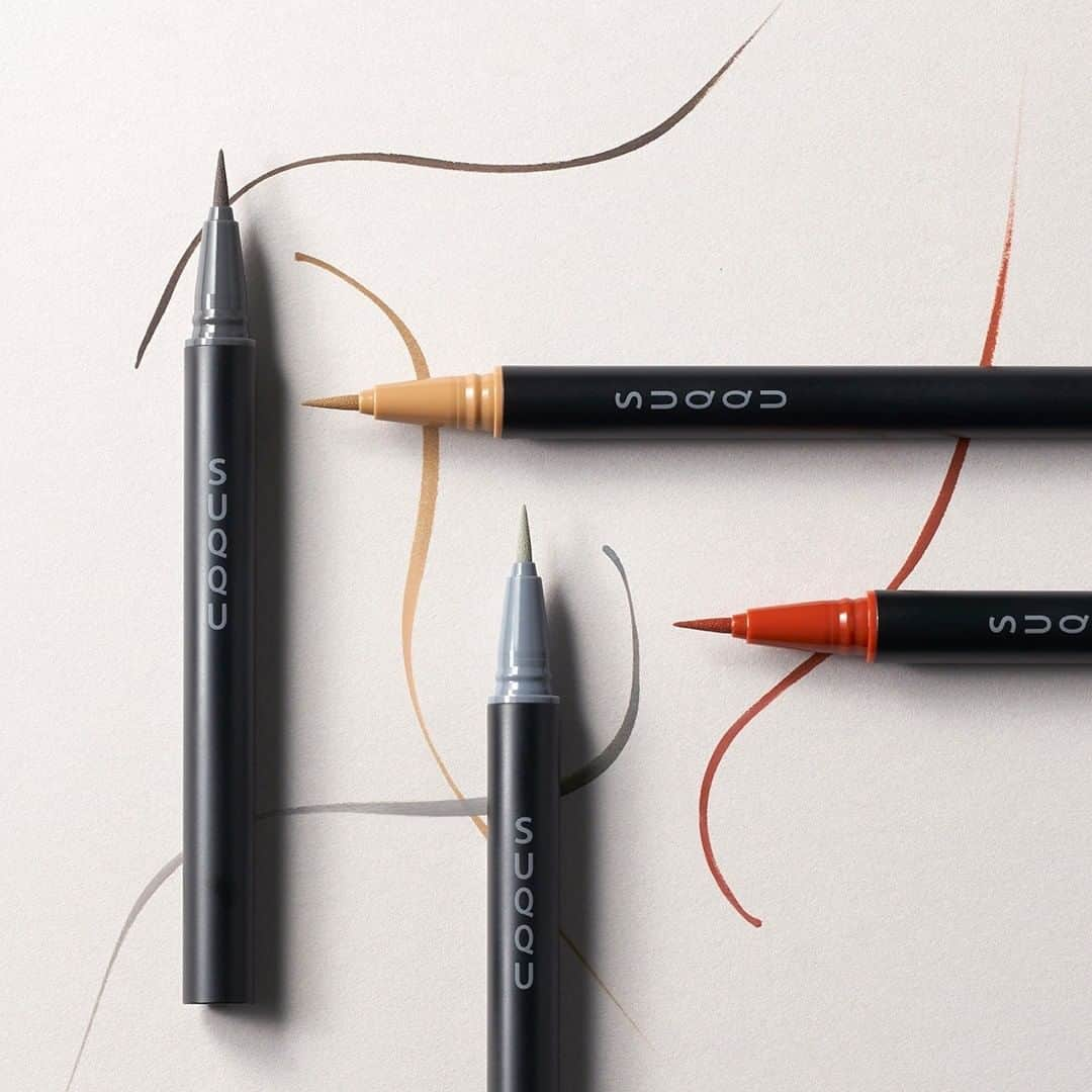 SUQQU公式Instgramアカウントさんのインスタグラム写真 - (SUQQU公式InstgramアカウントInstagram)「Elegantly thick, effortlessly thin. A felt-brush eyeliner designed to give exquisite style.  NUANCE EYELINER ・01 BLACK ・02 BLOWN ・03 GREY ・101 ORANGE *limited edition  しなやかに太く、抜けるように細く。 フェルト筆が鮮やかに描き出すニュアンス。大人の洒落色アイライナー。  ニュアンス アイライナー ･01 ブラック ･02 ブラウン ･03 グレー ･101 オレンジ *限定色  粗細眼線，滑順易勾勒。 在眼際間自由勾勒色彩線條的毛氈筆型眼線筆。  晶采艷色眼線筆 ･01 黑色 ･02 咖啡色 ･03 灰色 ･101 橙色 *限定色  #SUQQU #スック #suqqucolormakeup #2021spring #cosmetics #ニュアンスアイライナー #jbeauty #springcollection #newproducts」1月22日 17時00分 - suqqu_official