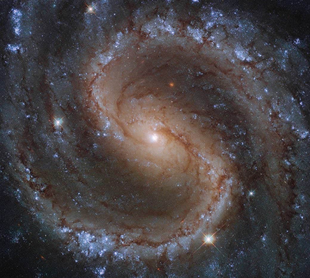 のインスタグラム：「A galaxy far, far away...  50 million light-years from Earth, in the constellation of Virgo, the "lost galaxy" NGC 4535 shines, with its delicate swirls of newborn stars, burning furiously against their cool, blue ancestors.  Despite the incredible quality of this image, taken from the NASA/ESA Hubble Space Telescope, NGC 4535 has a hazy, somewhat ghostly, appearance when viewed from a smaller telescope - inspiring its nickname, the “Lost Galaxy”.  Credit: ESA/Hubble & NASA, J. Lee and the PHANGS-HST Team  #NASA #Universe #Galaxy #Stars #Dreamy #Hubble #Virgo」