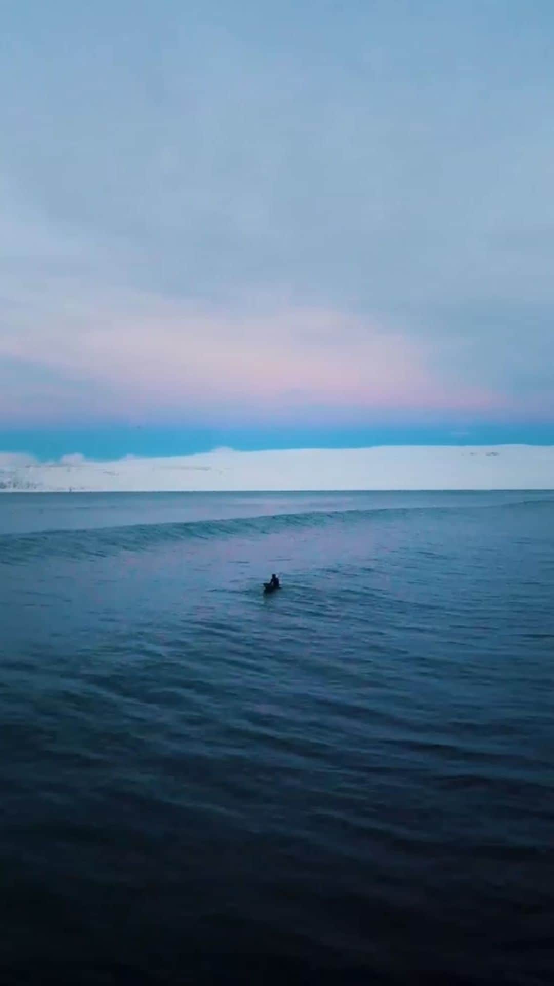 クリス・バーカードのインスタグラム：「Deep cut from “Under an Arctic Sky”  @jquinny gliding through Iceland’s winter in a 6mm wetsuit. 🎥 by @benweiland」