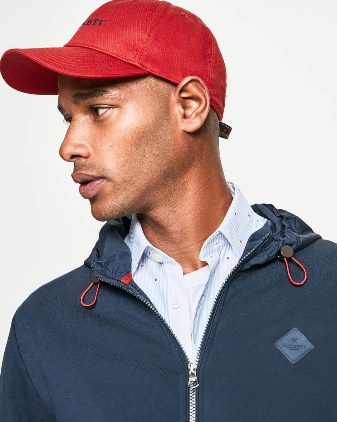ハケットのインスタグラム：「Warmer days are coming. Make the most out of them with our transeasonal hoodie. Crafted in fine cotton, it features a drawstring hood in matt fabric, but this is one of its many details. Discover them all using the link in our bio. #STAYHackett」