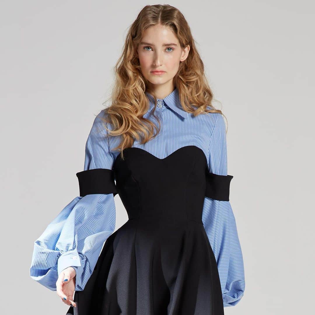 サラバターリアのインスタグラム：「...YOUTH FW21 COLLECTION  Namara wears the Heart dress, the puffed shirt and the combat Camden-A in black printed croc.  (For all of those asking, the new collection will be available on sarabattaglia.com and in the best luxury stores starting from July!)  #SaraBattaglia」