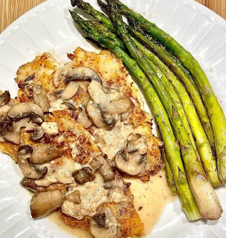 Flavorgod Seasoningsさんのインスタグラム写真 - (Flavorgod SeasoningsInstagram)「PARMESAN CRUSTED TILAPIA W/ CREAMY GARLICKY MUSHROOM PARMESAN SAUCE 🌟 by @_dashofhappiness_ seasoned with flavorgod Garlic Lovers Seasoning!⁠ -⁠ Add delicious flavors to your meals!⬇️⁠ Click link in the bio -> @flavorgod  www.flavorgod.com⁠ -⁠  soooo easy & tasty! It turned out nicely crisped, and the garlicky Parmesan sauce complimented it so well; it was a delicious dinner!⁠ ⁠ INGREDIENTS⁠ * 6-7 Tilapia fillets⁠ * 1 cup almond flour⁠ * 1 cup shredded Parmesan⁠ * salt, pepper, and 2 tsp oregano⁠ * 2 eggs, beaten⁠ * 3/4 mushrooms, sliced⁠ * 1 cup heavy cream⁠ * 1 cup chicken broth (low sodium)⁠ * salt & pepper to taste⁠ * 3 tbs butter⁠ * 2 tsp @flavorgod garlic lover’s seasoning⁠ * 1/2 cup shredded Parmesean⁠ * 1/8 tsp xanthan gum (if needs ti be thickened)⁠ 🌟⁠ METHOD⁠ * In a bowl, mix almond flour, Parmesan, salt, pepper and oregano. In a selerate bowl, beat eggs.⁠ * Heat skillet with 2 tbs olive oil. Pat dry your tilapia. Drench in beaten eggs then coat each side throughly in flour mixture. Sear in heated pan, 3-4 minutes each side over medium high heat.⁠ * Once both sides are nicely browned and crispy, remove and set aside.⁠ * in the same pan, add butter and mushrooms. Stir to brown about 3-4 mins. Add in cream, broth, salt, pepper, garlic powder & Parmesan. Bring to a boil and whisk then to a simmer over medium heat.⁠ * While stirring add xanathan gum if needs to be slightly thickened.⁠ * Serve sauce over tilapias, with a squeeze of fresh lemon!⁠ -⁠ Flavor God Seasonings are:⁠ ✅ZERO CALORIES PER SERVING⁠ ✅MADE FRESH⁠ ✅MADE LOCALLY IN US⁠ ✅FREE GIFTS AT CHECKOUT⁠ ✅GLUTEN FREE⁠ ✅#PALEO & #KETO FRIENDLY⁠ -⁠ #food #foodie #flavorgod #seasonings #glutenfree #mealprep #seasonings #breakfast #lunch #dinner #yummy #delicious #foodporn」1月24日 9時01分 - flavorgod