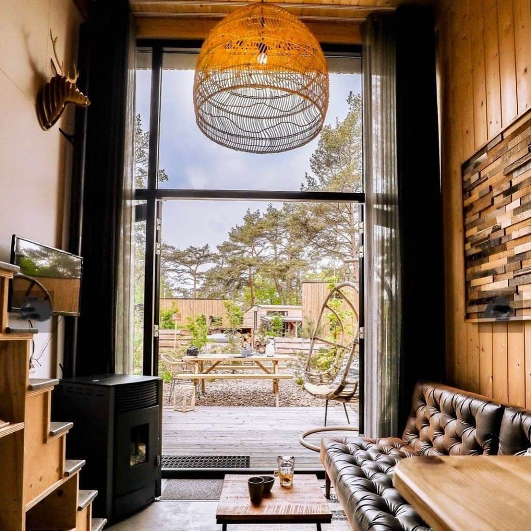 Airbnbのインスタグラム：「Fia is a restorer and designer who loves breathing new life into old furniture and spaces. Lucky for us, she’s also a Superhost. Her tiny house sits right on the edge of De Hoge Veluwe National Park, so things don’t get any less beautiful when you venture out. Hop on one of the vast park’s free white bikes and roll through landscapes ranging from sand dunes to forest, keeping an eye out for red deer and wild boar.   Photo: @tinyhousehogeveluwe」