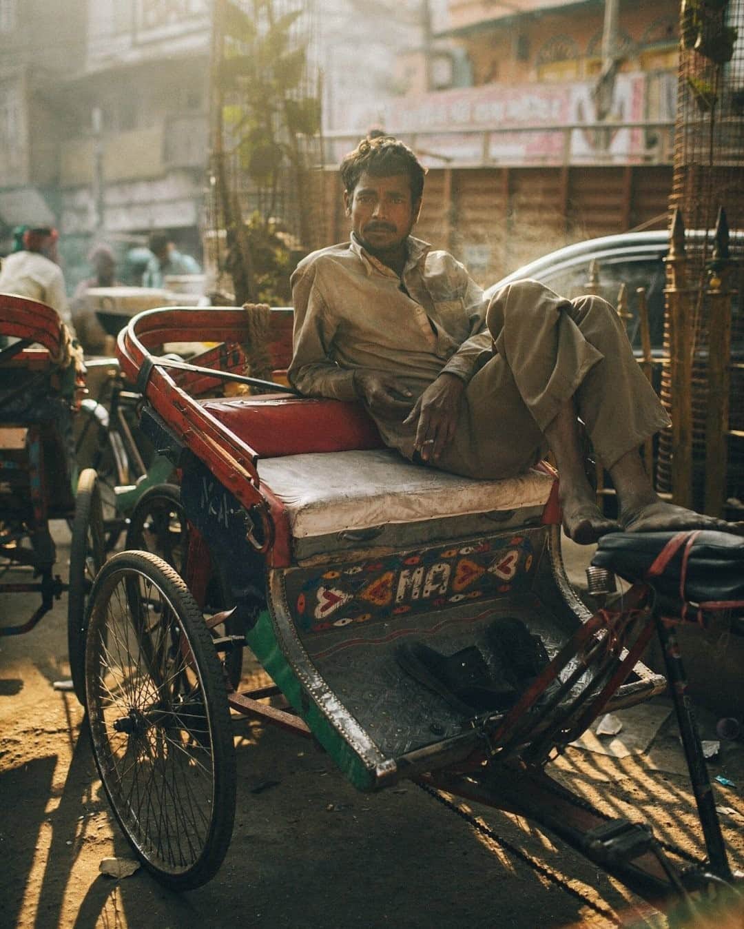 National Geographic Travelさんのインスタグラム写真 - (National Geographic TravelInstagram)「Photo by @joshuacogan / A rickshaw driver takes a break between customers in Old Delhi. While India is increasingly beset by auto traffic, the older ways of moving goods and people throughout the city still persist. No city I have ever been to shows time and transformation quite as New Delhi does. For more images of India and people and places throughout the world, follow me @joshuacogan.」1月25日 0時37分 - natgeotravel