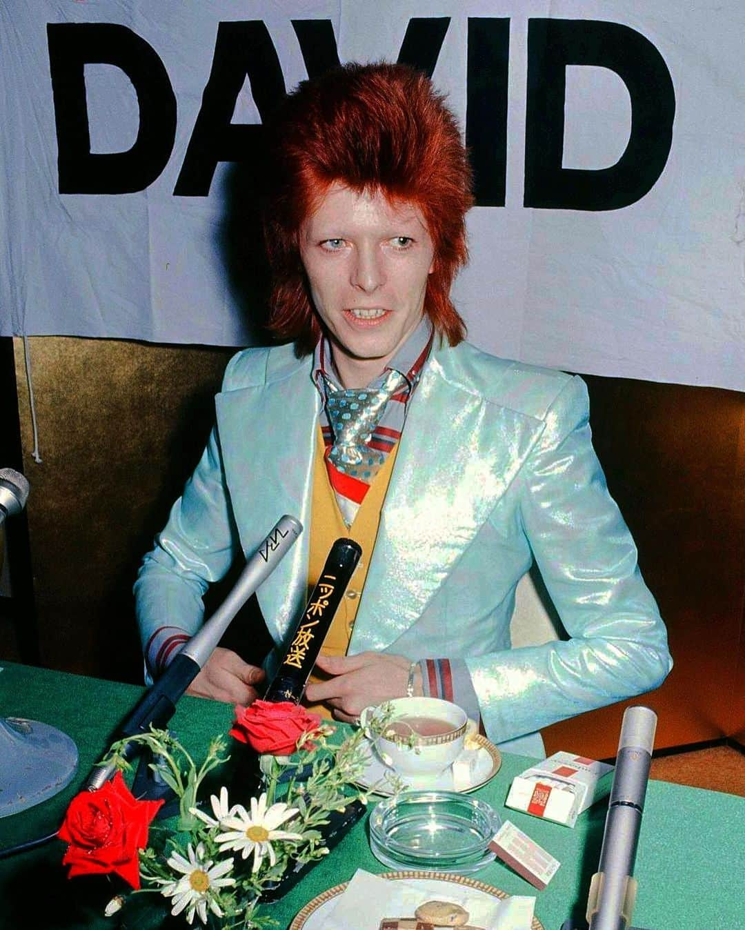 デヴィッド・ボウイさんのインスタグラム写真 - (デヴィッド・ボウイInstagram)「DAILY BOWIE THING – Day 79  “Sake and strange divine…”  On Thursday 5th April 1973, David Bowie and travelling companion, Geoff MacCormack, docked at Yokohama in Japan aboard the SS Oronsay. Slide #1 in our slideshow was taken during a press conference at Imperial Hotel, Tokyo, the following day, as were slides #4 & #10, © Koh Hasebe / Shinko Music Archive.  To coincide with David’s 8-date mini tour of Japan (his first in Japan), RCA issued two promotional albums in the shape of the compilation ROCK 'N' ROLL NOW and Aladdin Sane. They are pictured on slide #2 along with a flier for the Tokyo shows and a press advert.   Brian Ward’s 1972 Ziggy 'Droog' picture was prominent on the albums and in the associated advertising, along with his Ziggy 'hi-kick' photograph which had graced the front of RCA’s 1972 re-issue of The Man Who Sold The World.  Japanese journalists were given a beautiful press kit housed in the paper envelope pictured on slide #3. The kit contained folded versions of the two colour posters (behind David in slide #4), featuring shots taken by Masayoshi Sukita. The two black & white 10x8 promo photos on slide #5 utilising the same shots were also in the press kit.   The live shot from the tour on slide #6 features in Bowie and Sukita’s incredible Speed Of Life book, issued by Genesis Publications in 2012, as does the photo taken in February 1973, at RCA Studios in New York, on slide #7. One of the colour posters also featured a shot from this session.   Slide #8 is the cover of an A4, 28-page, promo booklet included in the press kit. We’re not sure if this was available commercially on the tour too, though there was also a lavish official Japanese colour tour programme. Anybody out there know?   The single-sided leaflet on slide #9 was contained in the kit as were several pages of tour itineraries and other information.   As you've no doubt guessed, this press kit is very rare and just never shows up these days, though the booklet on slide #8 does turn up every now and again.  #DailyBowieThing  #BowiePressKit  #BowiePromoPhotos  #BowieJapan」1月25日 10時04分 - davidbowie