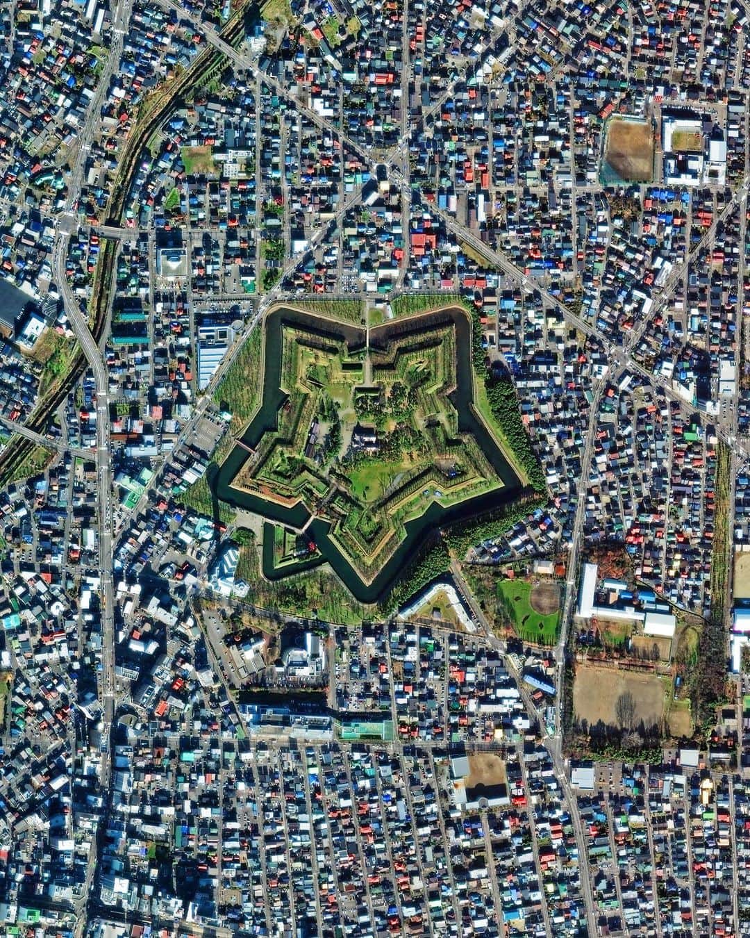 Daily Overviewさんのインスタグラム写真 - (Daily OverviewInstagram)「Goryōkaku — meaning, literally, “five-point fort” — is a star fort in the city of Hakodate, Japan. The fortress was built by the Tokugawa shogunate in the mid-1800s to protect the Tsugaru Strait from a possible Russian invasion. Today, Goryōkaku serves as a park for the city’s 280,000 residents, as well as a national Special Historic Site and a hub for cherry-blossom viewing in the spring. - Created by @overview Source imagery: @maxartechnologies」1月26日 2時40分 - dailyoverview