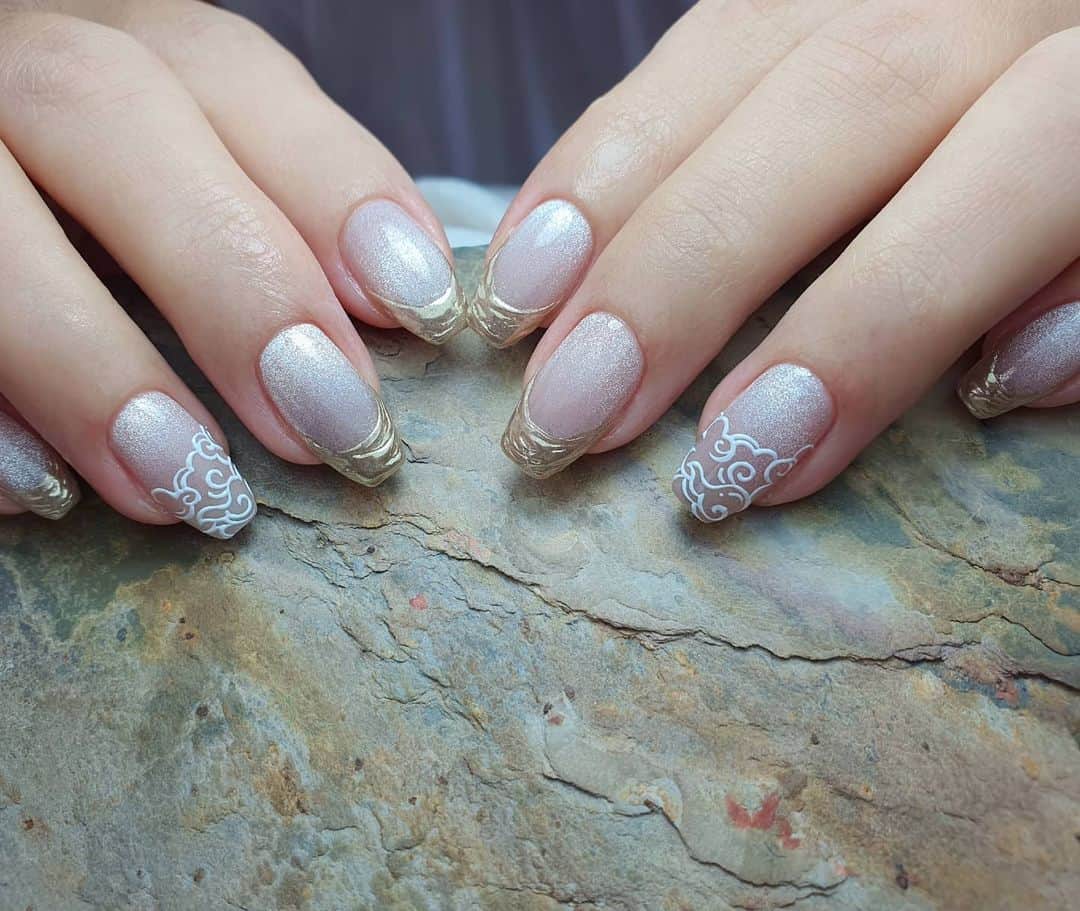 Yingのインスタグラム：「I used PREGEL Tulle Grege and added crystal cat eye effect. Embossed Japanese clouds done with PREGEL Art Liner gel in White. Items can be purchased at @nailwonderlandsg 🤗 . Design adapted from @itohanako  . 🛒 www.nailwonderland.com⁣⁣ 📍20A Penhas Road, Singapore 208184⁣⁣ (5 minutes walk from Lavender MRT)⁣⁣ .  I am currently only able to take bookings from my existing pool of customers. If I have slots available for new customers, I will post them on my IG stories. Thank you to everyone who likes my work 🙏 if you need your nails done, please consider booking other artists at @thenailartelier instead ❤  #ネイルデザイン  #ネイルアート #ネイル #ジェルネイル #nailart #네일아트 #pregel #プリジェル #nails #gelnails #sgnails」