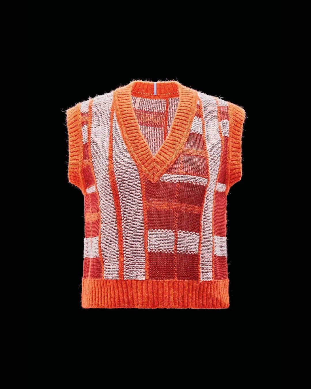 マックキュー アレキサンダー・マックイーンのインスタグラム：「The Check Knit Vest from FOAM is knitted from linen-blend with touches of cosy wool and alpaca in a bold patchwork effect check.  Available now in 100 selected stores worldwide and on GOAT.COM」
