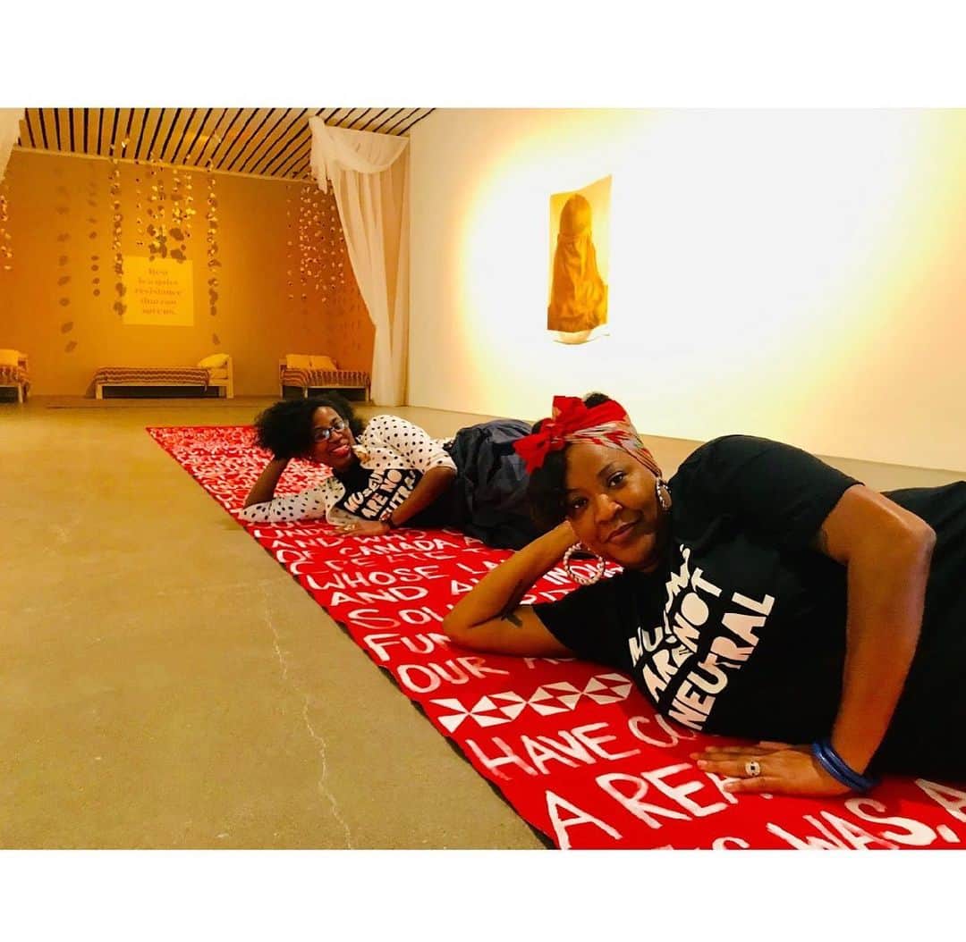 Grace Bonneyさんのインスタグラム写真 - (Grace BonneyInstagram)「@moanaloveniu: Day 2: In creating the Red Carpet with Kyle Goen @kyledidthis (my homie for life! He is going to hate that I am mentioning this: he is now a Grammy nominated artist 2021 for his cover design of Lil Wayne's album, aww yeahhhh!) I learned how I can combine painting, design, performance, music, activism and activation--and have all exist in the same time and space. I love these words of brilliant curator La Tanya Autry @artstuffmatters who exhibited the Red Carpet in her show, Temporary Spaces of Joy and Freedom at moCA (Cleveland, Ohio) last year: “We stand in support of the return of their lands. This is where we must begin. Decolonize this place.” These three last lines of Red Carpet (2016), a 30-foot painted floorcloth, issue a strong call for action. Artists Vaimoana Niumeitolu @moanaloveniu and Kyle Goen @kyledidthis , both members of the activist organizations Decolonial Cultural Front and Decolonize This Place (DTP) @decolonizethisplace have installed iterations of their bold red and white floorcloth both inside and outside. The work creates a pathway to disrupt the status quo of North American settler colonialism when exhibited on the steps of the Smithsonian Arts and Industries Building in Washington D.C., at the NY Stands with Standing Rock protest at Washington Square Park, at DTP’s “Nine Weeks of Art and Action” interventions in the halls of the Whitney Museum of American Art in New York, and other sites.  The painted text on Red Carpet references the Lenni Lenape people of the present-day New York area where the artists reside, and all Indigenous people. Now installed on the floor of moCa, it connects to the past and present Indigeneous communities of this area including but not limited to, the Erie and members of the Haudenosaunee Confederation. When walked on, the carpet heightens our awareness of self in space and place. In turn, the impressions left from our foot traffic underscore the floorcloth’s message that we are all on Indigenous lands. United with Red Carpet’s previous activations, here at Temporary Spaces of Joy and Freedom is where we must begin." #decolonizethisplace #museumsarenotneutral  @blackliberationcenter」1月27日 3時32分 - designsponge