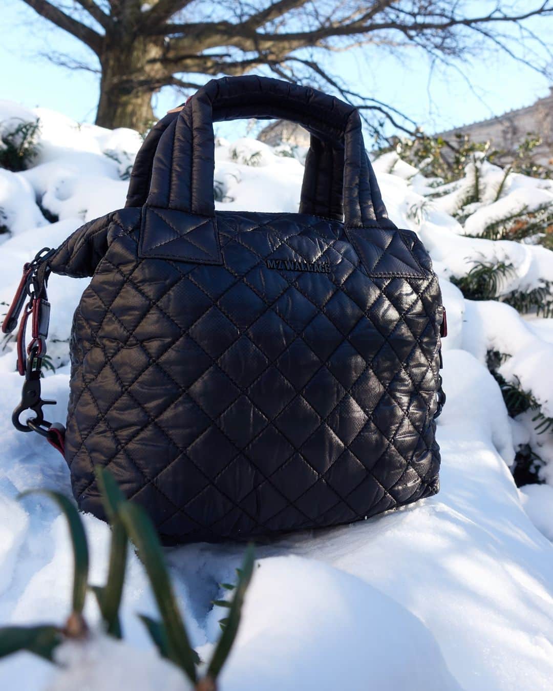 MZウォレスのインスタグラム：「A little precipitation? 'Snow problem! (See what we did there?) Our water and stain-resistant materials keep your belongings out of harm's way, no matter the weather. Tap to shop!」