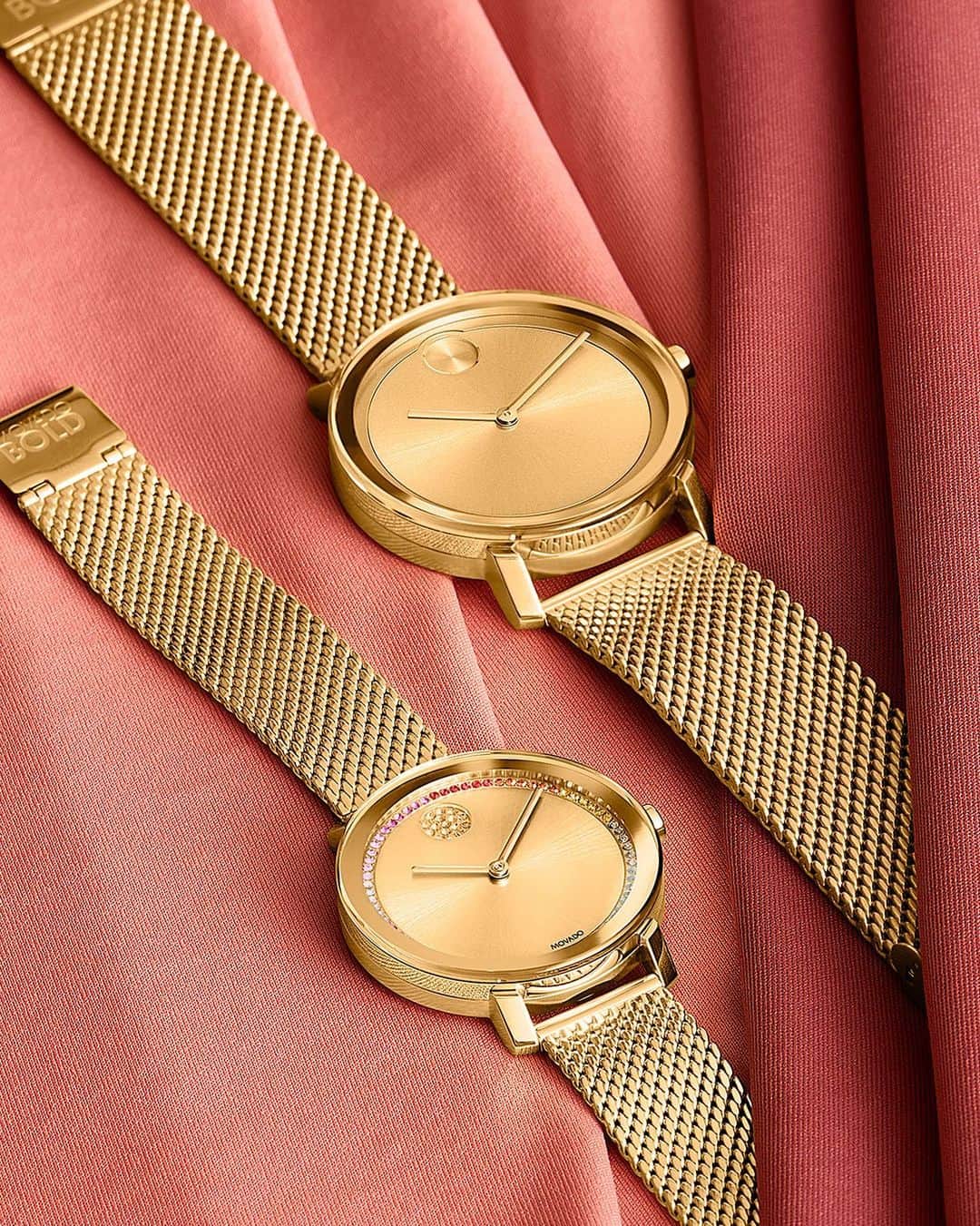 モバードのインスタグラム：「Stand out in gold and mesh that softly drapes around the wrist. Rainbow crystals on the dial for your valentine- who wouldn’t want a little more color in their life? #MovadoBOLD」