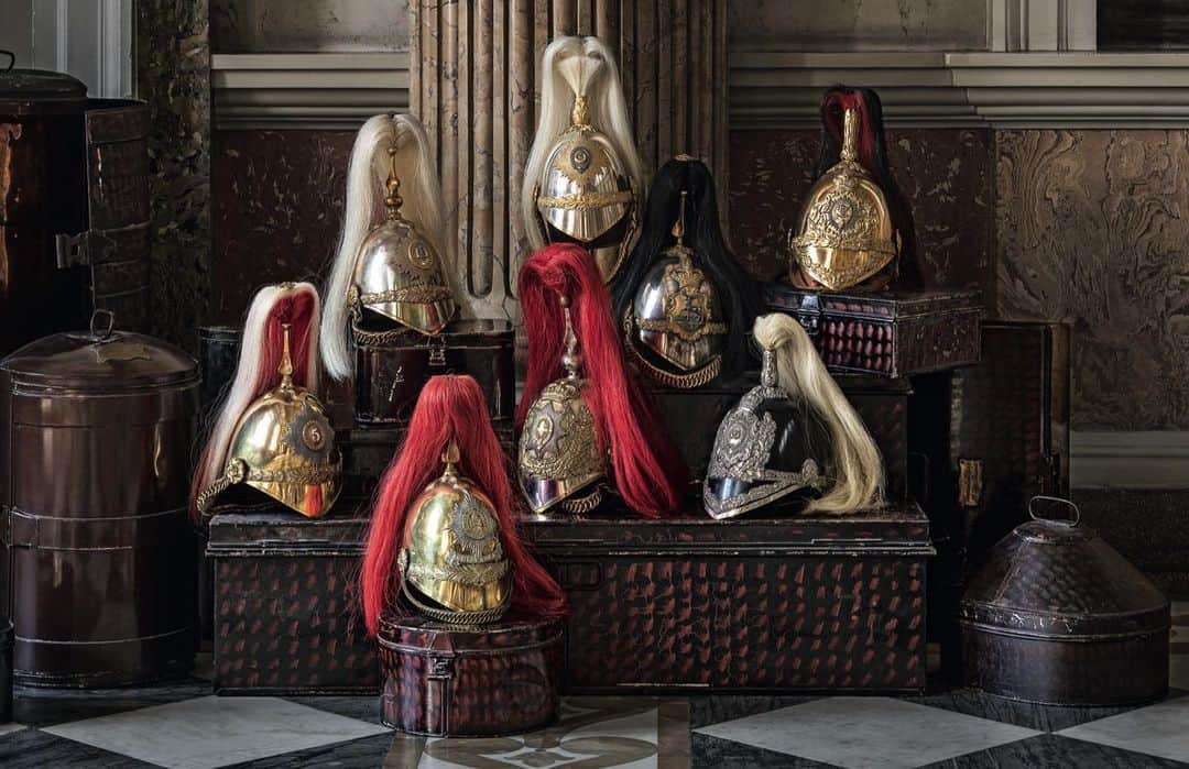 ギーブス&ホークスのインスタグラム：「Continuing on in the celebrations for our 250th year, we will be introducing you to a special curated selection of the Gieves & Hawkes incredible archive.   Cavalry and infantry helmets with sundry storage tins. Hawkes specialised in military headgear and accoutrements from the early nineteenth century.  📷 Photographed at Wentworth Woodhouse, South Yorkshire.   #GievesandHawkes250 #Heritage #GH250 #BritishHistory #GievesandHawkes #Menswear」
