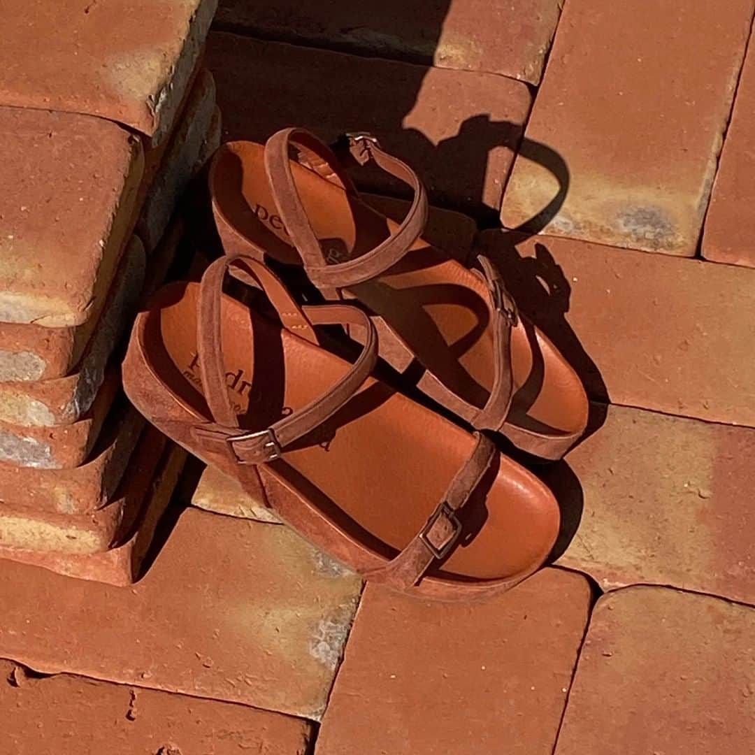 ペドロガルシアのインスタグラム：「For Pedro Garcia and @todobarro , everyday luxe is all about craftsmanship. Handmade terracotta tiles make the perfect backdrop for our sleek suede sandals.」