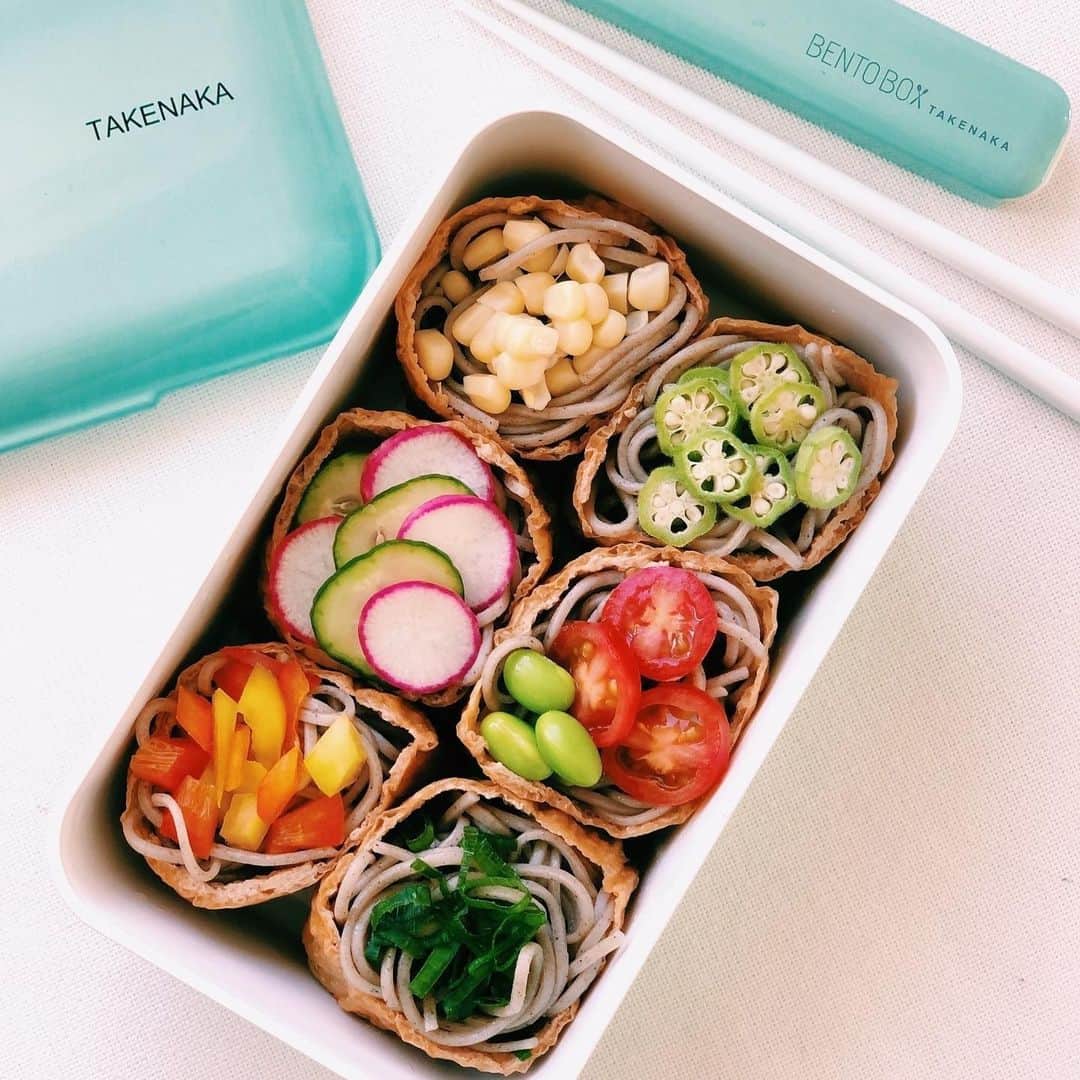 TAKENAKA BENTO BOXのインスタグラム：「"I will stuff up my bento box with Soba Inari! You may know Inari sushi is made of deep fried tofu pouch filled with sushi rice. How about trying to substitute with Soba noodles? And top with your favorite veggies! The Inariage is sweet, the soba is a little salty, you would definitely enjoy the harmony! " 😋🙌⁠ ⁠ Soba Noodles Inari in Takenaka BENTO BITE ⁠Blue Ice by talented @azusasasakiho 🇯🇵❤️⁠ ⁠ Check out our INTO THE BOX blog for this recipe! Link in bio⬆️」
