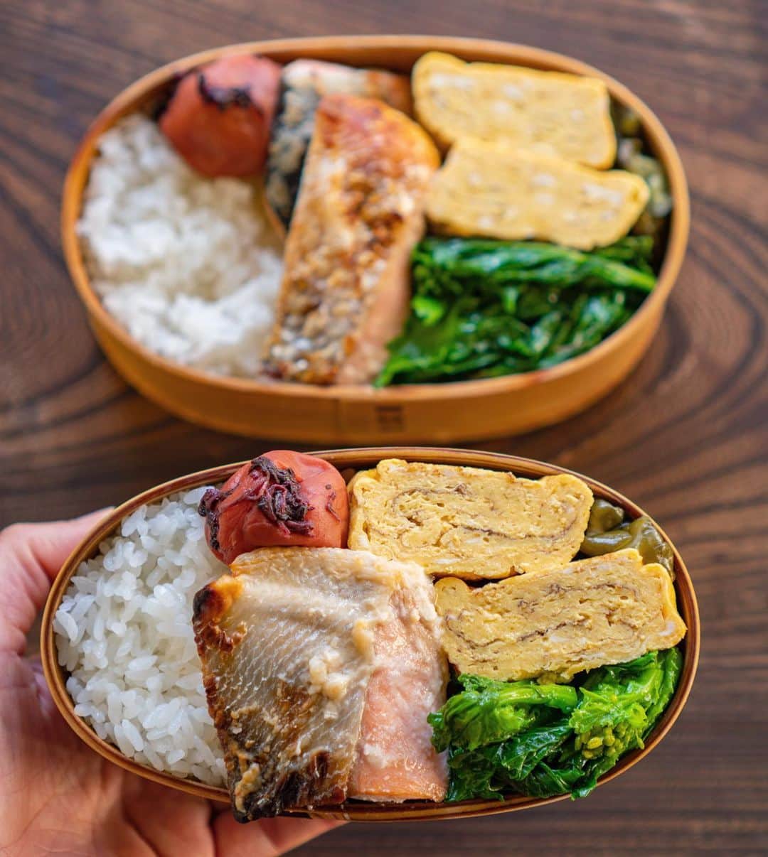のインスタグラム：「○鮭の西京焼き弁当○ ・ 鮭西京焼き たまご焼き 菜の花のナムル 柴漬けと梅干 ・ 茄子のお味噌汁(フリーズドライ) ・ 最近急にTVの字幕にピントが合わなくなって困っている。距離にして3Mくらいかな。👓が必要だろうか。老眼なんだろうか。 そもそもずっと視力が良かったのでまごまごするばかり🙌🏼 ・ 気がつけば1月も最終週💨 ・ #obento #bento #lunchbox #お弁当 #おべんとう#曲げわっぱ#わっぱ#鮭弁当#鮭弁#西京焼き#西京焼き弁当」