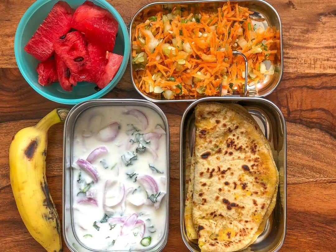 Archana's Kitchenさんのインスタグラム写真 - (Archana's KitchenInstagram)「#lunchboxideas  A delicious meal with simple elements, pack this lunch box with Stuffed Mooli Paneer Paratha paired with Onion raita and carrot salad and some fruits on the side.  Get the recipe from the smart.bio link in my profile @archanaskitchen .」1月29日 14時30分 - archanaskitchen