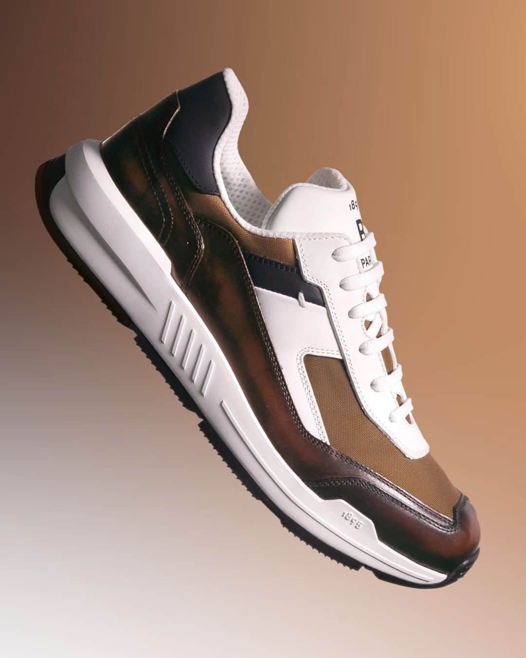 ベルルッティのインスタグラム：「- THE #BERLUTI PULSE BY @kris_van_assche -  Introducing the new “Pulse” sneakers in a Venezia, nylon and leather variation which takes on an emblematic TDM Intenso patina.   Now available In-Store and on the E-Shop.」