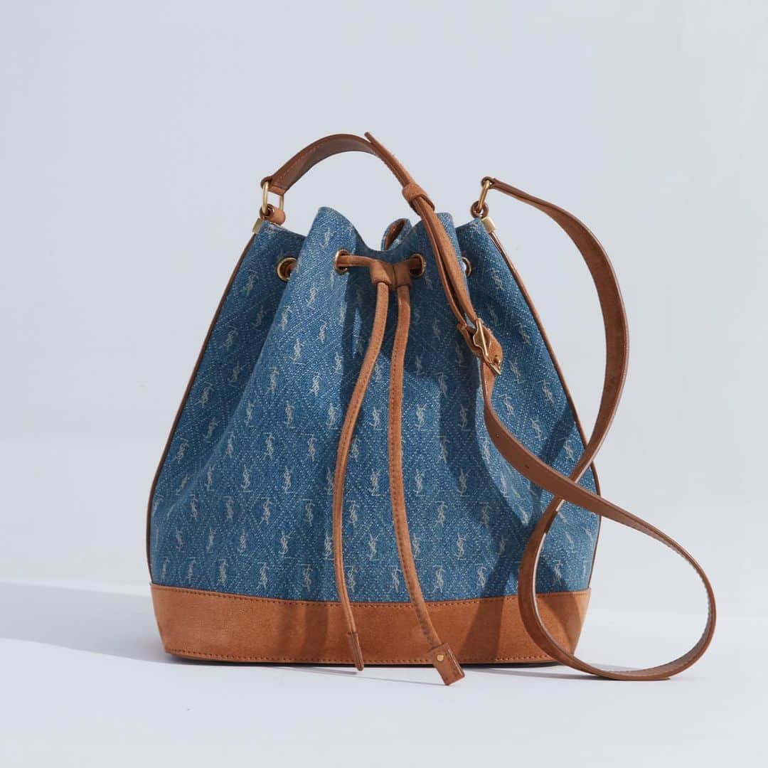 Saks Fifth Avenueのインスタグラム：「HANDBAG HEROES: @ysl updates the classic bucket bag with a modern spin in monogram denim. #SaksStyle」