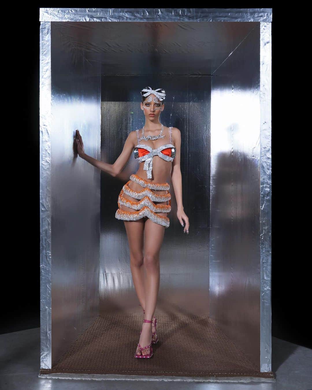 のインスタグラム：「@Area designers Beckett Fogg and Piotrek Panszczyk used Swarovski crystals to embellish this bodycon look from their debut Couture Spring 2021 collection. ”For these pieces, we were looking at South African Ndebele women, who have a rich history of personal adornment and expression through arts and crafts,” they said.  #AREANYC #Swarovski」