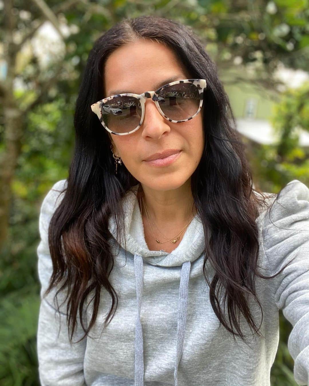 レベッカミンコフのインスタグラム：「Got as far as my porch today. Cozy and cold call for our #janinehoodie」