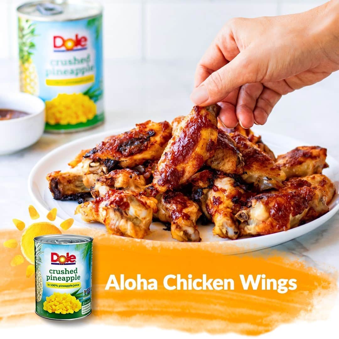 Dole Packaged Foods（ドール）のインスタグラム：「Bring a taste of Hawaii to your game day celebration with these Aloha Chicken Wings!   INGREDIENTS •	25 individual chicken wings •	1/4 cup soy sauce •	3 tablespoons cider vinegar •	2 tablespoons garlic salt •	1 tablespoon onion powder •	1 teaspoon ground ginger •	1 teaspoon paprika •	1 can (20 oz.) DOLE Crushed Pineapple in 100% Pineapple Juice •	1 cup ketchup •	1/4 cup packed brown sugar  DIRECTIONS 1) Split chicken wings at joints; discard wing tip. Place chicken in a single layer in two baking pans sprayed with vegetable cooking spray. Pierce skin with fork. 2) Combine vinegar, garlic salt, onion powder, ginger and paprika; brush over chicken. 3) Bake at 400°F., 30 minutes, turning chicken over halfway through cooking. 4) Combine undrained crushed pineapple, ketchup, brown sugar and soy sauce in small bowl. Spoon half of sauce over wings. 5) Bake chicken 15 minutes more. Turn wings over; spoon remaining sauce over wings. Bake 15 minutes more or until chicken is no longer pink in center. Serve warm.」
