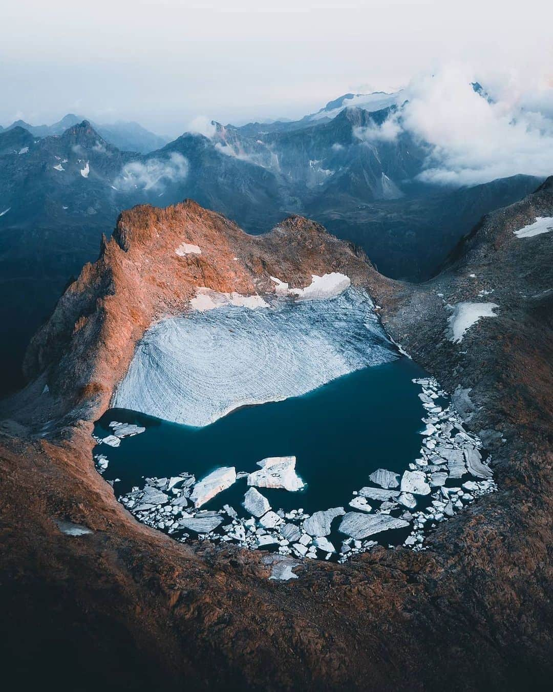 Instagramさんのインスタグラム写真 - (InstagramInstagram)「#HelloFrom the Lepontine Alps. 🏔❄️ ⁣ ⁣ We dream of taking in the view of this remote lake and glacier from up high on the Swiss-Italian border. ⁣ ⁣ Photo by @marvin_walter」2月1日 2時06分 - instagram