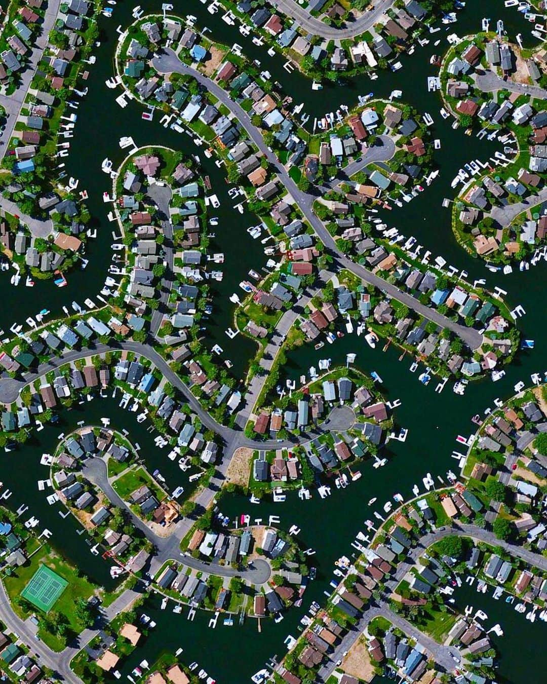 Daily Overviewさんのインスタグラム写真 - (Daily OverviewInstagram)「Tahoe Keys is a waterfront gated community in El Dorado County, California, USA. Built in the 1960s, the community consists of more than 1,500 homes on a series of canals that connect to Lake Tahoe. Its construction destroyed half of the Upper Truckee Marsh, the primary filter for river water entering the lake, and has since been called the most environmentally damaging intrusion on the lakeshore in Lake Tahoe’s human history. - Created by @overview Source imagery: @maxartechnologies」2月1日 5時28分 - dailyoverview