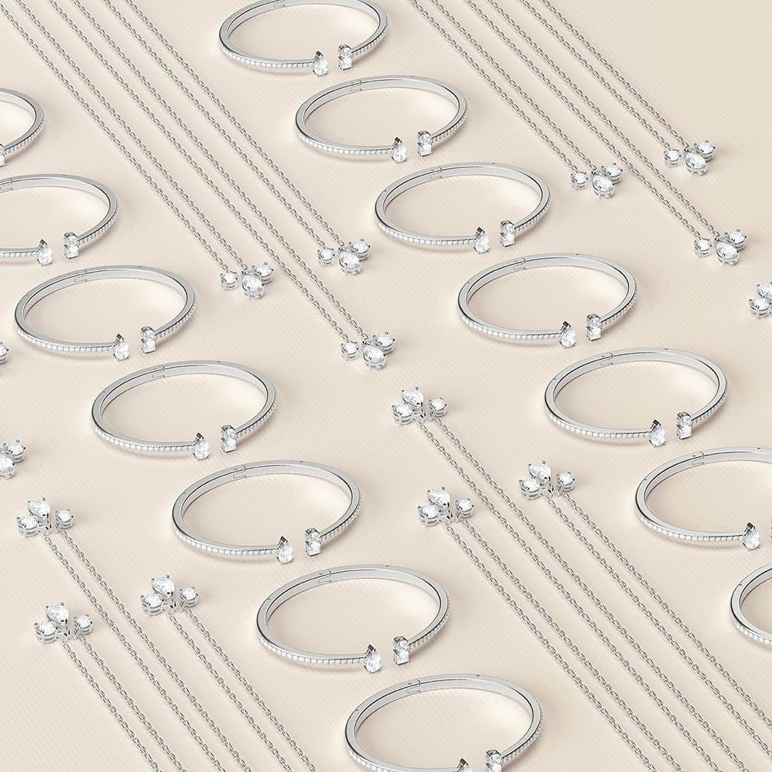 のインスタグラム：「Searching for the perfect Valentine's Day gift? Choose an eye-catching pendant or cuff from the Swarovski Attract family – both timeless designs that will become their new everyday essentials. #Swarovski」