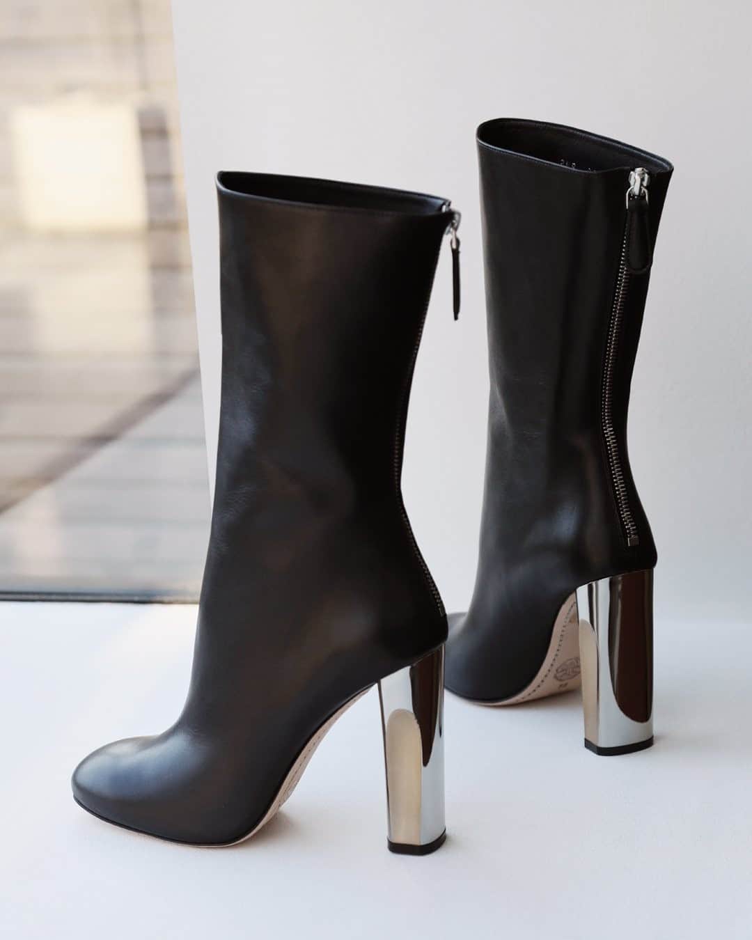 The Outnetのインスタグラム：「Ankle boots or knee-high!? We can't decide! Oh wait, we don't have to, we can opt for @alexandermcqueen's mid-calf style instead.  Shop all your favorite Instagram looks, just visit the link in bio」