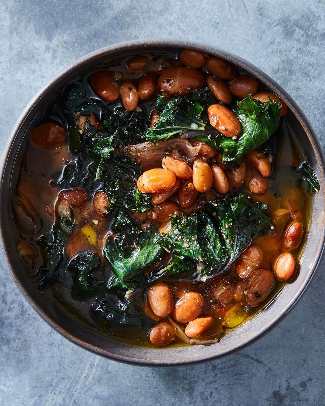 Food52さんのインスタグラム写真 - (Food52Instagram)「Easy to make, flavor-packed, & under $10 from start to finish—@rebeccafirkser's most recent Nickel & Dine column  is a love letter to beans (& the magic of *not* throwing away your Parm rinds)! Get the recipe, plus her budgeting tips, at the link in bio. 📸: @juliagartland」2月28日 8時00分 - food52