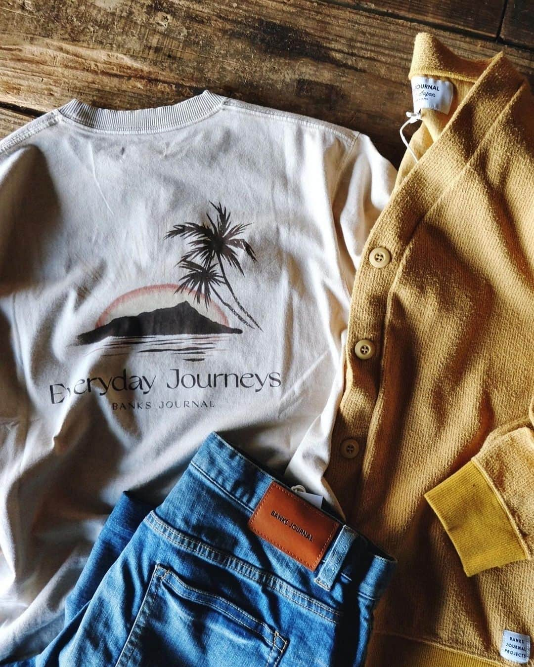 PORT of CALL Cafe&Store Tokyoのインスタグラム：「#pocoitems Coastal side mood @banksjournal Tee : ¥5,800 (+tax.) Cardigan : ¥17,500 (+tax.) #BJP Denim : ¥23,500 (+tax.) #BJP All stuffs stocked @poc_daikanyama #portofcall ・ 柔らかい渋さが魅力の #マスタードカラー をカーディガンで取り入れて、アメカジを #大人カジュアル にアップデート。古着屋さんで眠っているようなヴィンテージ感が魅力の新作Tシャツでレトロさを拝借🌞✨ @banksjournal #banksjournal ・ ・ @poc_daikanyama Cafe and Store 🍔☕️🍪 Open 11:30🌞 - Close 20:00🌝 ✔︎自粛期間中の営業時間です ✔︎週末祝日は12:00オープンです #portofcall #cafeandstore #渋谷 #代官山」