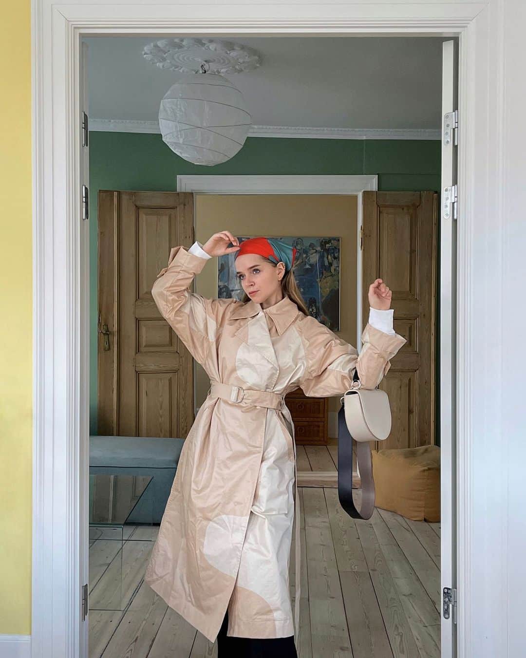 のインスタグラム：「Stepping into the spring with timeless classics and playful details. Marie, @mariejedig , wearing the Kantakulma coat with the fun and playful accessories, the Itta bag, and the Tyrsky scarf.  ⠀⠀⠀⠀⠀⠀⠀⠀⠀ Explore our Pre-Spring 2021 collection celebrating the art of printmaking at marimekko.com and in-store. #marimekko」