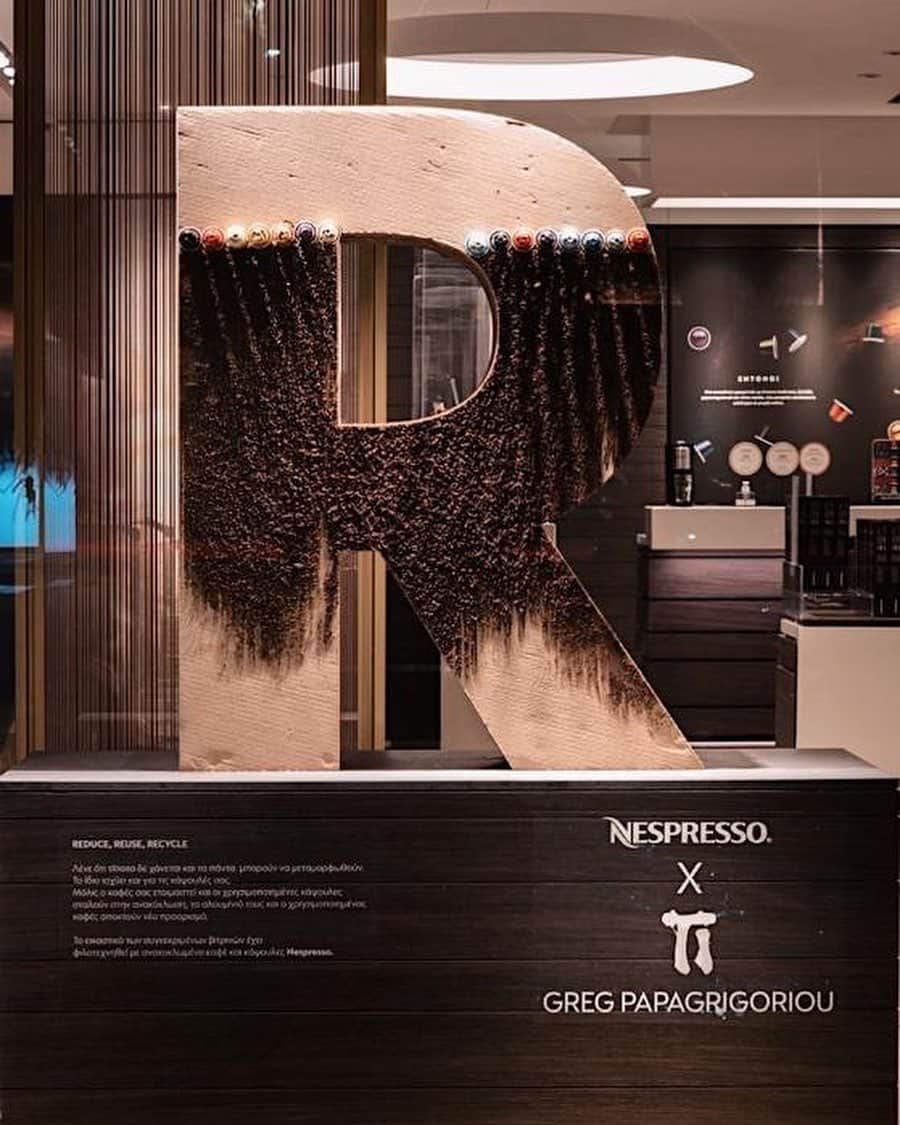 Nespressoさんのインスタグラム写真 - (NespressoInstagram)「One statement, one artist, one rule:   We have asked local artists around the world to express their views on how #DoingIsEverything –  by each creating sustainable #NespressoWindows with upcycled materials. 🌏♻️  🇬🇷 Greece  #DoingIsEverything by artist @greg_papagrigoriou in our Athens Glyfada Boutique.​   Visual artist Grigoris Papagrigoriou’s display is entirely made out of sustainable and recycled material.  The artist plays with recycled capsules and coffee ground, transformed into a ‘new paint’ — to illustrate the earth at the center of a “Doing is Everything” cardboard-letter installation.   The work celebrates the importance of recycling and keeping the earth at the center of all our initiatives.   #Nespresso #NespressoWindows #DoingIsEverything」2月28日 22時08分 - nespresso