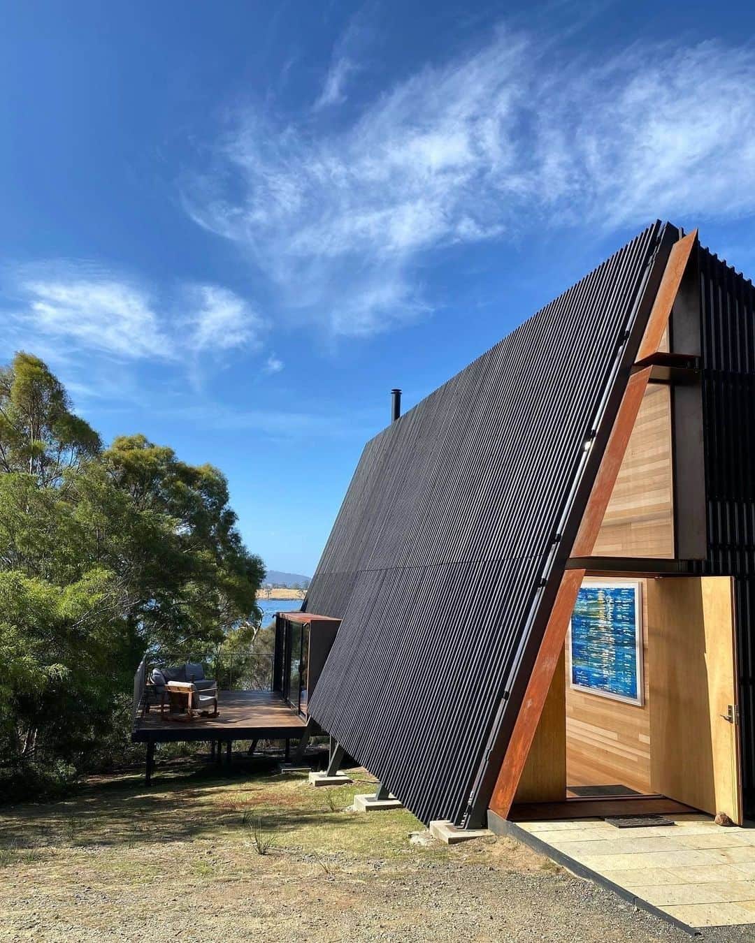 Airbnbのインスタグラム：「This audacious, wish list–worthy gem somehow also harmonizies with the serene beauty of Bruny Island. Explore the bay in your front yard or just enjoy the wild solitude (potentially interrupted by the occasional wandering wallaby). When you feel like something sweet to balance out the salty sea breezes, head to Bruny Island Honey to sample the work of local bees in countless forms, including ice cream.  Photo: @alexandracuthbert」