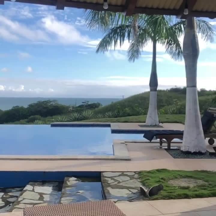 Airbnbのインスタグラム：「Soak up all the stillness you can in the morning, because the rest of your day is bound to be action-packed. Playa Venao, one of Panama's best surfing beaches, is just five minutes from Superhost Carolina’s hilltop house. The waves are substantial but too smooth to be intimidating, making them a natural pairing with the local coffee.   Video: @vistadelmar_villa」
