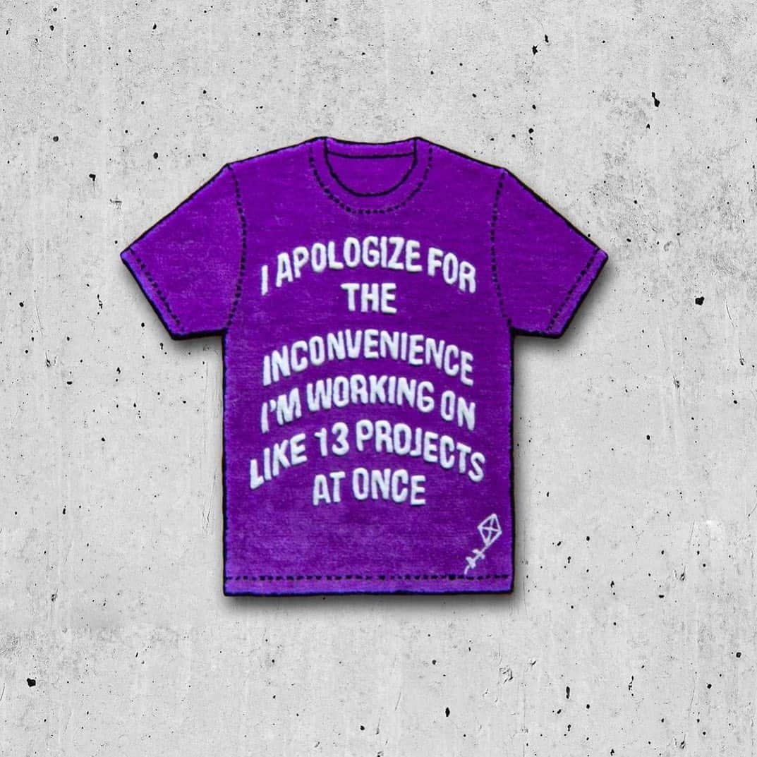 Paul Octaviousのインスタグラム：「This rug is literally me and I’ve never been seen so clearly 😩👀☠️😅   13 Projects Rug by Chicago Artist @kristopher.kites  ✏️ photo of a purple rug in black outline in the shape of a tshirt reads “I apologize for the the inconvenience I’m working on like 13 projects at once”  An outline of a tiny kite in white sits in the lower left hand corner of t shirt」