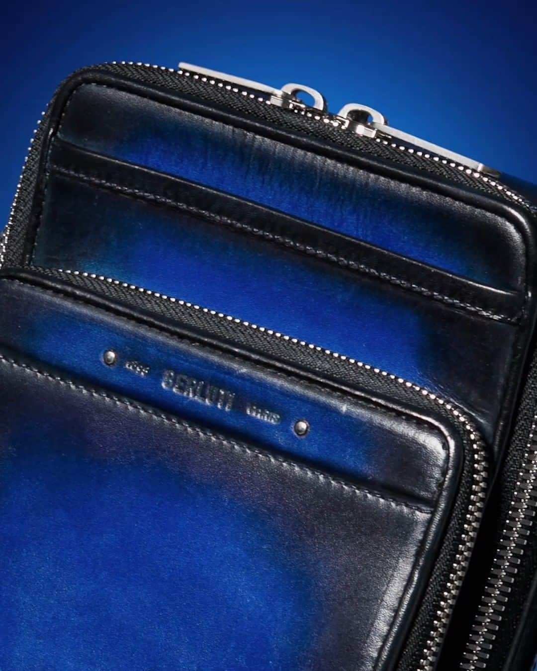 ベルルッティのインスタグラム：「- THE #BERLUTI UTOPIA BLUE PATINA -  Introducing the “Miles” leather messenger bag in its new Utopia Blue patina twist.   Now available In-Store and on the E-Shop.」