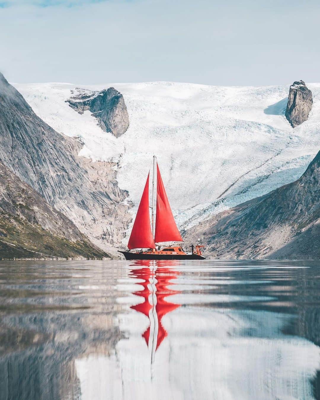 MR PORTERのインスタグラム：「In this week's #MRPORTERintheWilderness post, we’re travelling from the PNW to Greenland. Can you feel the chill? "I took these photos in Greenland. Mostly at the end of the Tasermiut Fjord, a 70-kilometre-long fjord in southwestern Greenland. No paths, no huts, no signal, no means of civilization, just this beautiful harsh northern landscape," explains photographer Mr Roman Königshofer (@rawmeyn). Who's up for going off-grid with us?」
