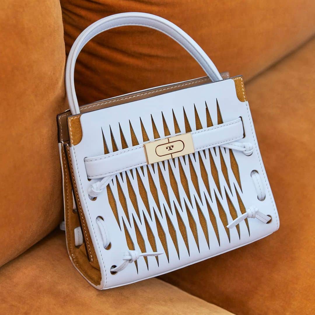 Saks Fifth Avenueのインスタグラム：「@toryburch serves up fresh accessories this season in bright white hues and vintage-inspired silhouettes. #SaksStyle」