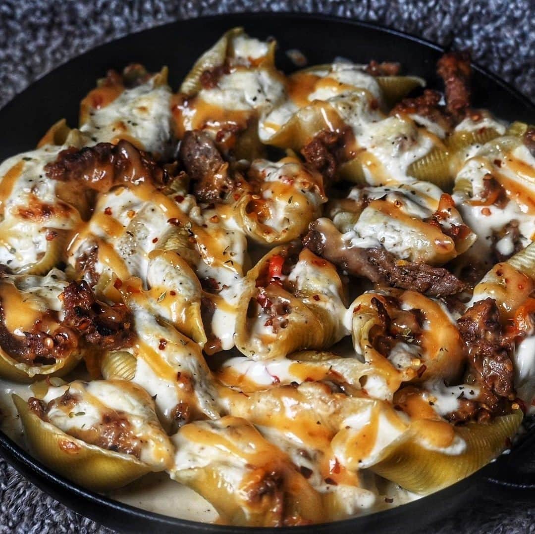 Flavorgod Seasoningsさんのインスタグラム写真 - (Flavorgod SeasoningsInstagram)「Customer @platesbykandt with some Philly Cheesesteak Stuffed Shells 🔥🔥⁠ -⁠ Seasoned with Flavor God Garlic Lovers Seasoning⁠ -⁠ Add delicious flavors to your meals!⬇️⁠ Click link in the bio -> @flavorgod  www.flavorgod.com⁠ -⁠ We used @barilla @barillaus shells and stuffed them with a perfect cheesesteak mixture seasoned with @flavorgod garlic lovers 🤤🤤⁠ ⁠ Topped this beautiful creation with a Thai Sweet Chili Sauce 🔥⁠ ⁠ @flavorgod garlic lovers⁠ @krogerco shaved steak⁠ @barilla @barillaus shells⁠ -⁠ Flavor God Seasonings are:⁠ 💥ZERO CALORIES PER SERVING⁠ 🔥0 SUGAR PER SERVING ⁠ 💥GLUTEN FREE⁠ 🔥KETO FRIENDLY⁠ 💥PALEO FRIENDLY⁠ -⁠ #food #foodie #flavorgod #seasonings #glutenfree #mealprep #seasonings #breakfast #lunch #dinner #yummy #delicious #foodporn」2月11日 9時01分 - flavorgod