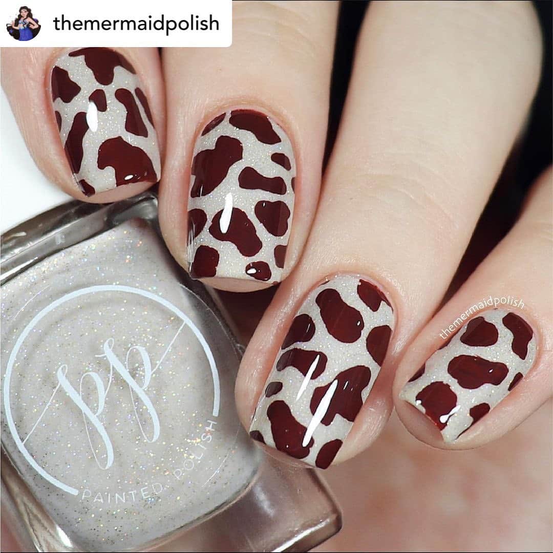 Nail Designsさんのインスタグラム写真 - (Nail DesignsInstagram)「Credit • @themermaidpolish Hello my fellow mermaids!  If you know what Brown Cow Stunning means then you rock!! 🐮 these are my Cow Print nails for @glamnailschallenge theme, specially made for @iammoniqueheart .  Here I’m using: 💅🏻 Painted Polish Beachy Keen 💅🏻 Lina Nail Art Supplies Gone Wild 02 💅🏻 Whatsupnails Sundae Topping 💅🏻 Glisten & Glow CTRL-ALT-DEL Latex 💅🏻 Glisten & Glow Top coat  Have a bubbly day!」2月11日 9時26分 - nailartfeature