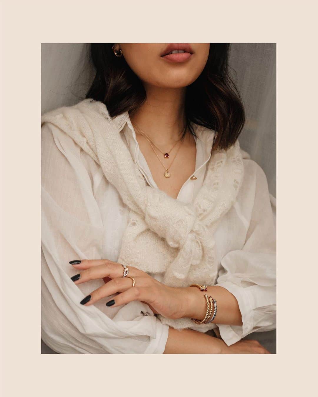 デビッドヤーマンのインスタグラム：「A fresh start for the Year of the Ox. @katiecung styles our Châtelaine garnet pendant, Cable Collectibles® moon & stars necklace and Cable bracelets with Petite Infinity and Cable Loop rings. #DavidYurman #TapToShop」