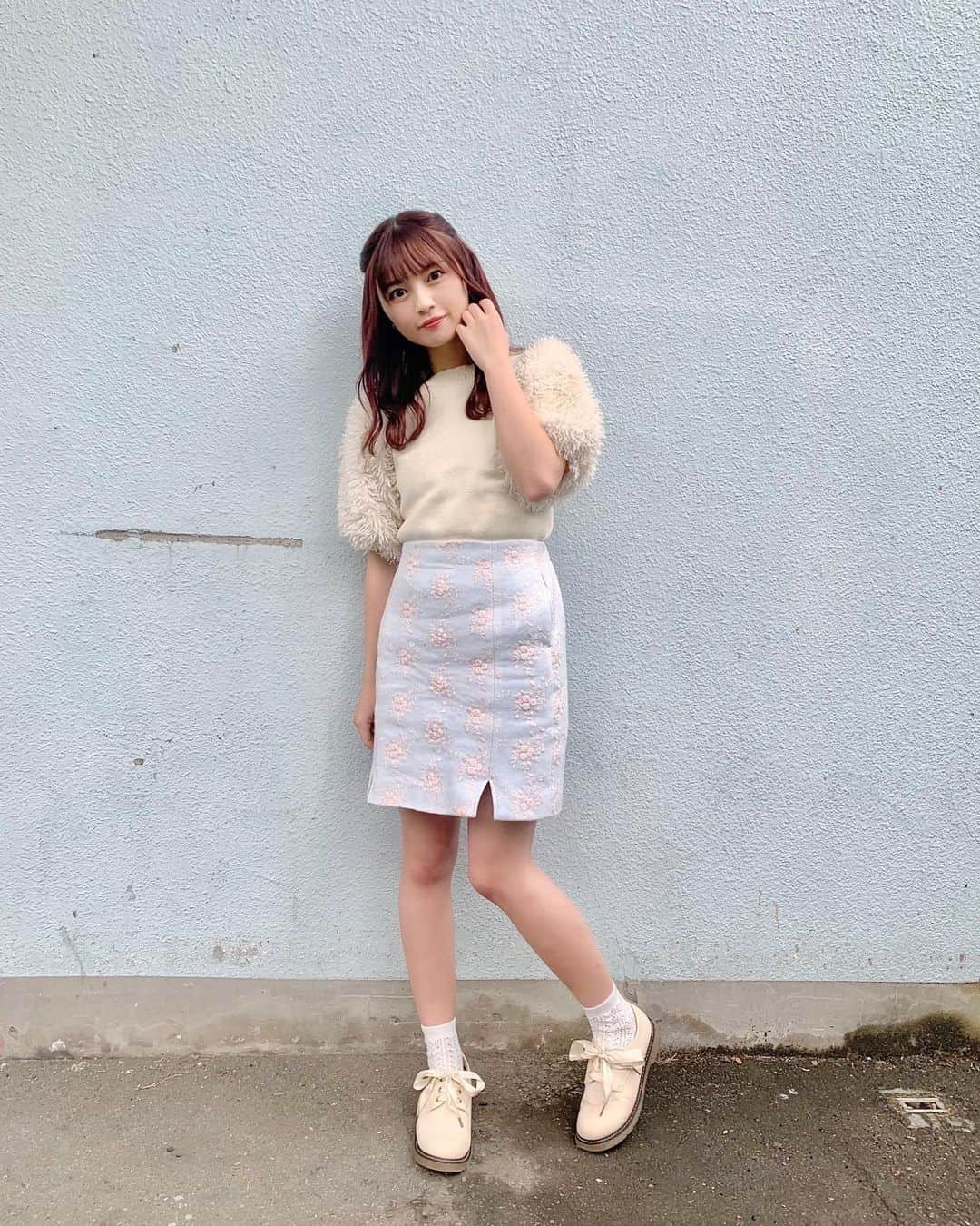 廣川奈々聖のインスタグラム：「春花火のMVで着てた衣装 🐈‪🍑 ﻿ ﻿ これ実は自分コーデなの！﻿ 自分っぽいなぁ〜﻿ って感じになった☁笑﻿ ﻿ ﻿ 袖がもこもこのニットと﻿ 淡い水色に、ピンクの刺繍っていう﻿ 珍しいスカートが可愛くてお気に入り〜！ ﻿ ﻿ ﻿ ﻿ ﻿ ﻿ 〈 message in English 〉﻿ Our new music video﻿  “ Haruhanabi “ has been update!﻿ ¨̮  ﻿ Have you seen the music video yet ?  ﻿ I chose this clothes myself. I like this ♡﻿ ﻿ New video is on wasuta’s youtube channel.﻿ Please check it out! 🌸﻿ ﻿ ﻿ ﻿ ﻿ ﻿ ﻿ #私服コーデ#半袖ニット#春コーデ#春花火#英語間違ってたらこっそり教えてね 🐰笑  @wasuta.world」