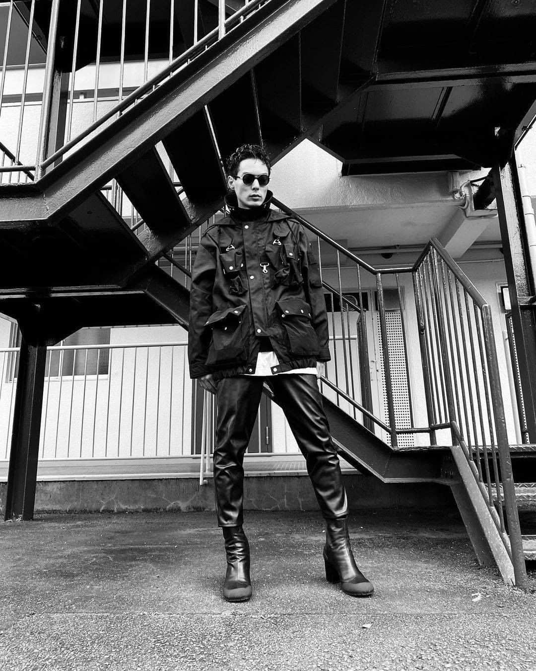タトラスのインスタグラム：「Military inspired Amos Man's Blouson from TATRAS × Riot Hill Collection paired with black leather pants and boots by @takuma_iwasaki.   #Tatras #Tatrasofficial  #Tatraspeople  #downjacket」
